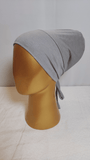 Full Coverage Tie-back Cap